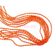 Нитка бусин овальная (10x4x4 мм) из оранжевого коралла 48 см