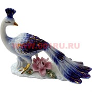 Павлин из белого фарфора