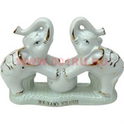 Два слоника на шаре из фарфора (11 см высота)